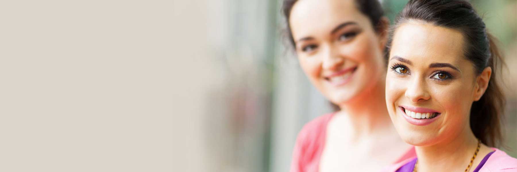 Patients smiling with dental implants in Missoula, MT